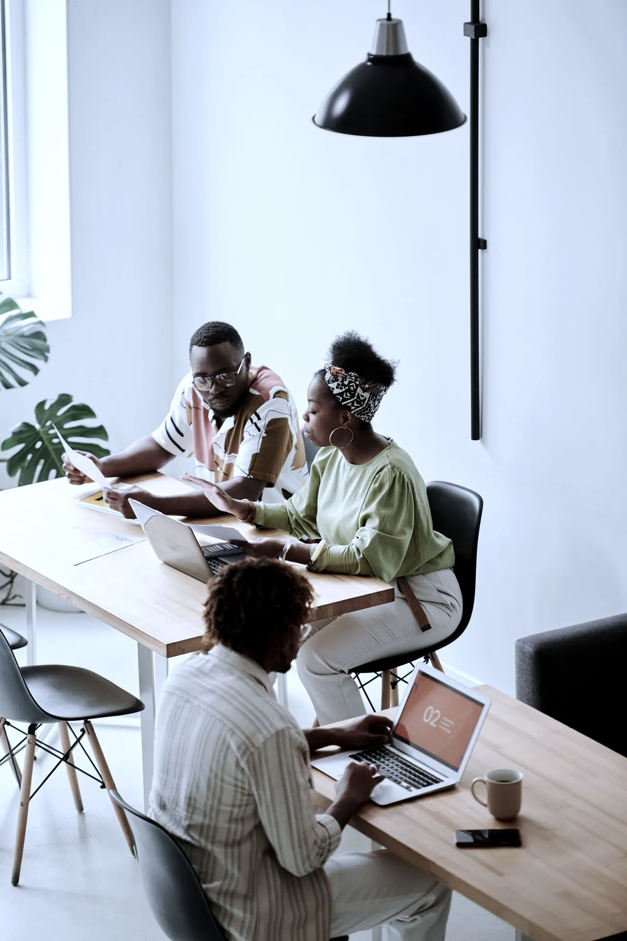 The team working together around a table